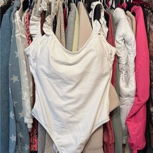 Womens White Ruffled-Strap One-Piece Bodysuit